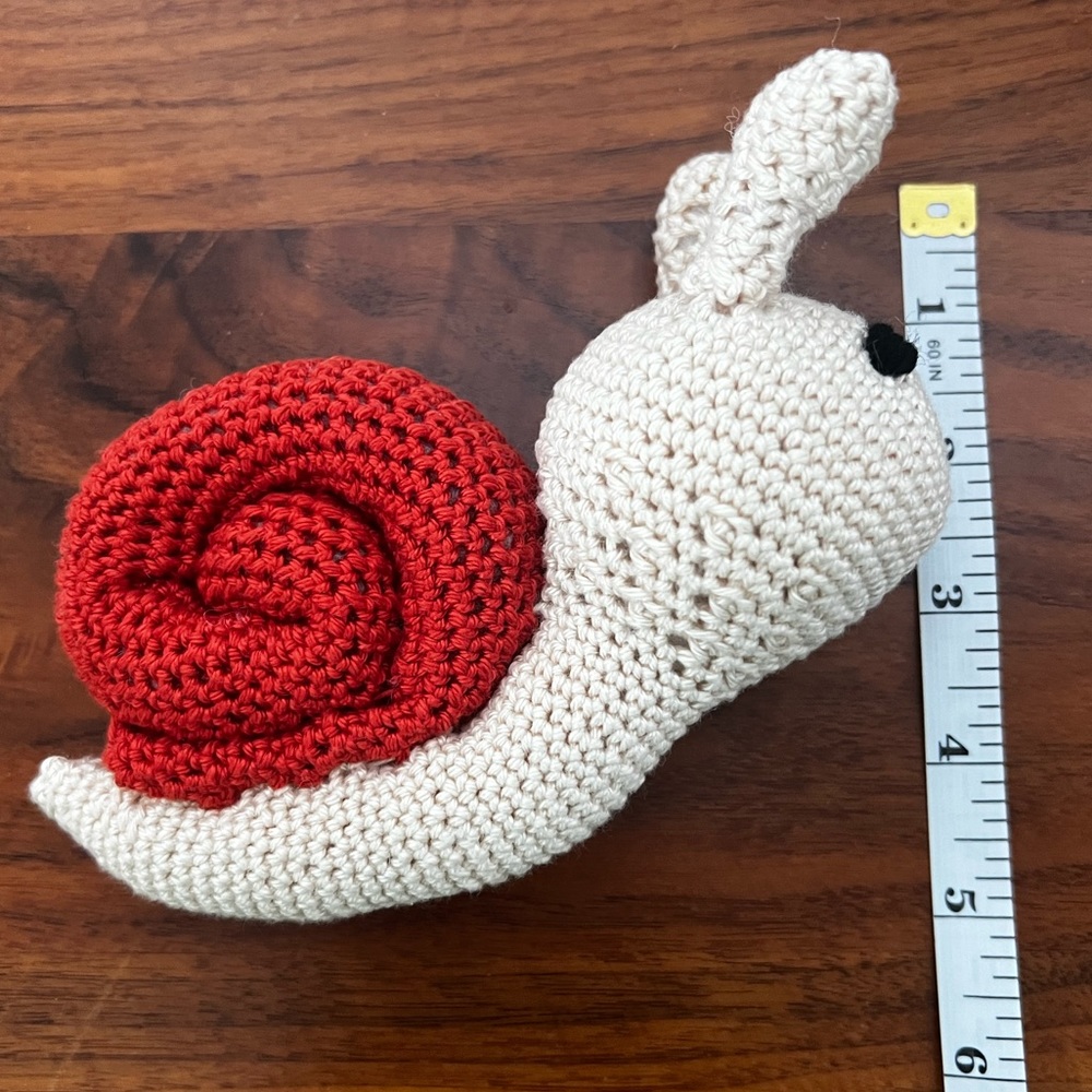 Hand a crocheted Sammy the Snail (Small)🐌 - Picture 2 of 7